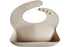 mushie Silicone Baby Bib | Adjustable Fit Waterproof Bibs (Shifting Sand)