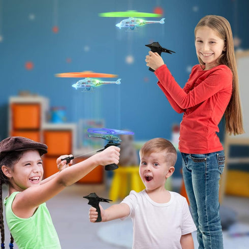 Set 2 8 3+ ArtCreativity Light Up Flying Helicopter Toys for Kids of with LED Lights, Handheld Launcher, Soars Over