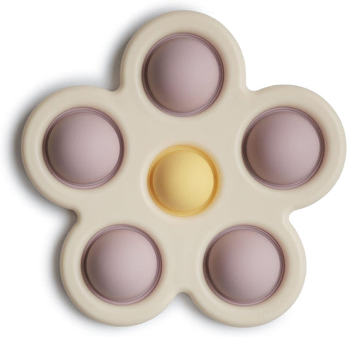 mushie Flower Press Toy in Soft Lilac, Daffodil, and Ivory