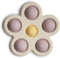 mushie Flower Press Toy in Soft Lilac, Daffodil, and Ivory