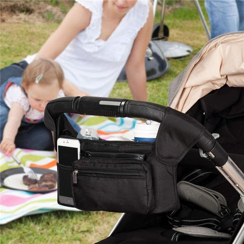 Generic The multi-functional baby carriage storage bag can be fixed on the vehicle. It has a cup holder and detachable
