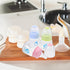 Set 9 Pack 4Oz Kisangel Mini Infant Feeding Bottles Plastic Baby Bottles with Soft Nipples Leak-Proof Design