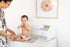 Ubbi Portable Diaper Changing Station Diaper Storage Caddy Organizer with Folding Changing Mat, Stores Baby Diapers