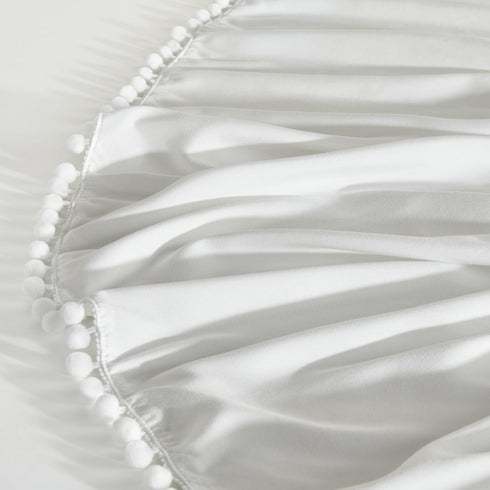 TILLYOU Ruffled Baby Crib Skirt with Pompoms, 28”x 52”, 14'' Drop, White for Girls and Boys