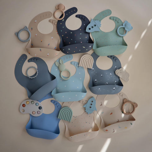 mushie Silicone Baby Bib, Adjustable Fit Waterproof Bibs (Planets)