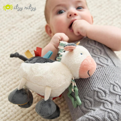 0 Itzy Ritzy Link & Love Toy for Stroller or Car Seat Features Textured Ribbons, Crinkle Sounds, Clinking Rings