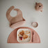 mushie Adjustable Fit Silicone Baby Bib | Waterproof Bibs (Blush)