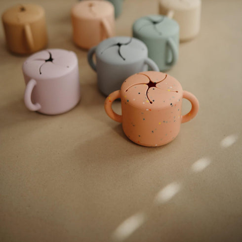 Mushie Spill Proof Snack Cup - Toddler Food Container in Powder Pink Confetti