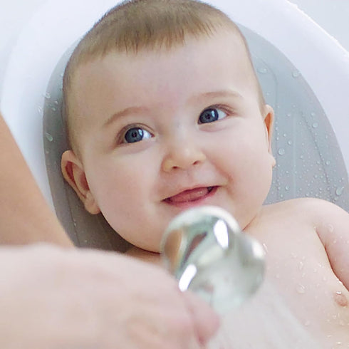 Ingenuity Easy Rinse Bather Baby Bath Seat, Non-Slip Soft Support for 0-6 Months, Up to 20 lbs