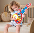 Hape 6-in-1 Music Maker - Colorful Guitar Shaped Musical Toy with 6 Instruments for Ages 18 Months+