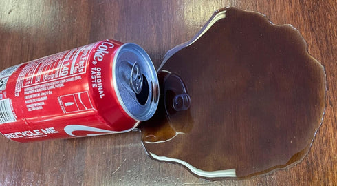 Generic Fake Spilled cola drink, prank, joke, gag from recycled soda cans