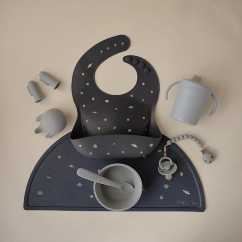 mushie Silicone Baby Bib, Adjustable Fit Waterproof Bibs (Planets)