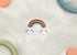 Reece Studio Rainbow Teether, Baby Travel Accessories, BPA Free Silicone Teething Toy, Easy to Hold Stroller Toy