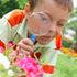 Elcoho 32 Pack Colorful Plastic Magnifying Glasses for Young People Party Favors Educational Toys with Storage Bag