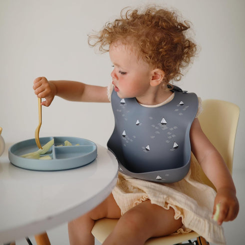 mushie Silicone Baby Bib, Adjustable Fit Waterproof Bibs (Planets)