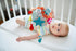 0-6 Miniland Baby Teether, Plush Baby Rattle, Toddler Toy for Teething, Sensory Development and Textured Fun, Fully