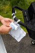 Ubbi Retractable On the Go Bag Dispenser for Baby Travel, Diaper Accessory Must Have for Newborn, Helpful Item, Baby