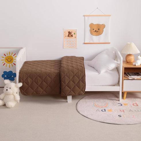 NTBAY Down Alternative Toddler Comforter, Lightweight Solid Color Baby Crib Quilted Blanket, 39x47 inches, Brown