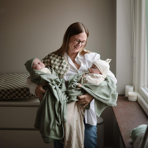 47"x47" mushie Stretchy Baby Swaddle Blanket | Extra Soft & Snug Fit | (Rainbows)