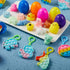 24 JOYIN PCS Prefilled Easter Eggs with Assorted ToysFilled with Mochi Squishy Toys and Pop Bubble Fidget