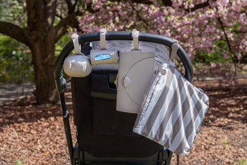 Ubbi Retractable On-the-Go Bag Dispenser - Baby Travel Diaper Bag Accessory, Taupe