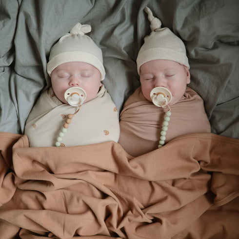 47"x47" mushie Stretchy Baby Swaddle Blanket | Extra Soft & Snug Fit | (Rainbows)