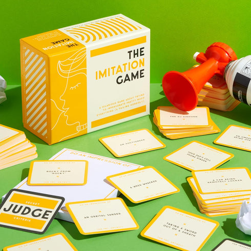 Brass Monkey The Imitation – Social Party Game with 300+ Game Card Prompts for Doing Impressions