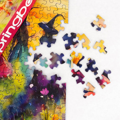 500 Springbok's Witches Gathering Piece Puzzle for Adults is a Watercolor Image of Witches Gathering in a Blossoming