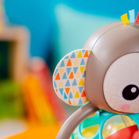Bright Starts Grab & Giggle Monkey Light-Up Musical Rattle Toy, Easy-Grasp for Ages 6 Months+, Unisex