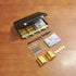 EKKZ 1:6 Set Scale Miniature Black Briefcase with Fake Gold Bars, Mini Dollar Bill Bundles, Vintage Coins & Toy Weapons