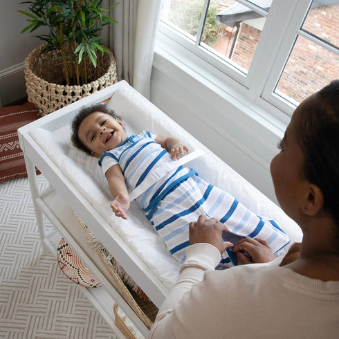Ingenuity Contoured Changing Pad Includes Waterproof Changing Liner and Safety Fastening Strap with Quick-Release