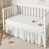 TILLYOU Ruffled Baby Crib Skirt with Pompoms, 28”x 52”, 14'' Drop, White for Girls and Boys