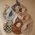mushie Muslin Baby Bib | Soft Cotton for Infant Drips, Drools & Feedings | Adjustable Fit | 2 Pack