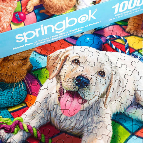 Springbok Playful Pups on Parade, 1000 Piece Puzzle for Adults and Families, Adorable Display of Puppies