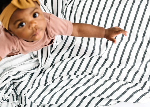 Copper Pearl Large Premium Knit Baby Swaddle - City Design