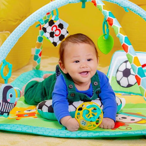 Tummy Bright Starts Grip & Kick Oball Activity Gym, Soccer Theme with Easy-Grasp Baby Toys, Baby Play Gym, Kick Pad