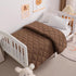 NTBAY Down Alternative Toddler Comforter, Lightweight Solid Color Baby Crib Quilted Blanket, 39x47 inches, Brown