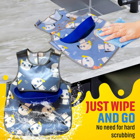 Plastic bib. Easiest bib to clean ever. No washer/dryer or scrubbing needed. 1T-3T