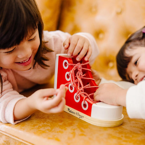 Melissa & Doug Learn to Tie a Shoe - Deluxe Wood Lacing Sneaker Toy