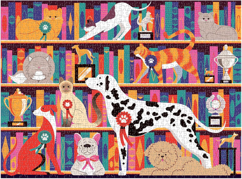 Galison Best in Show – Michael Driver 1000 Piece Puzzle Featuring A Witty Shelfie of Felines and Canines Sharing Trophies and Books