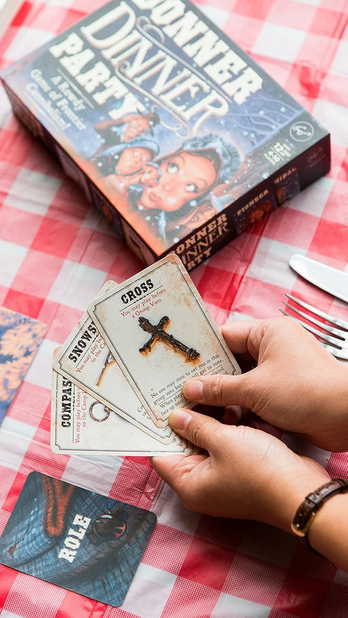 Chronicle Books Donner Dinner Party: A Rowdy Game of Frontier Cannibalism! (Weird Games for Parties)