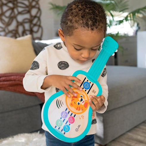 Baby Einstein Sing & Strum Magic Touch Ukulele | Wooden Musical Toy for Ages 6 Months+, Multicolored