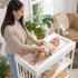 Ingenuity Contoured Changing Pad Includes Waterproof Changing Liner and Safety Fastening Strap with Quick-Release