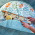 0-36 Ingenuity Sun Valley Wooden Baby Play Mat, Foldable A-Frame Bar, Machine-Washable Mat, Unisex, for Ages Months