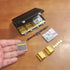 EKKZ 1:6 Set Scale Miniature Black Briefcase with Fake Gold Bars, Mini Dollar Bill Bundles, Vintage Coins & Toy Weapons