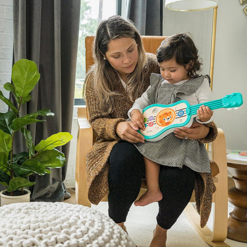 Baby Einstein Sing & Strum Magic Touch Ukulele | Wooden Musical Toy for Ages 6 Months+, Multicolored